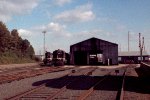 A GP30 & GP38-2 rest beside the engine house in Glenwood Yard